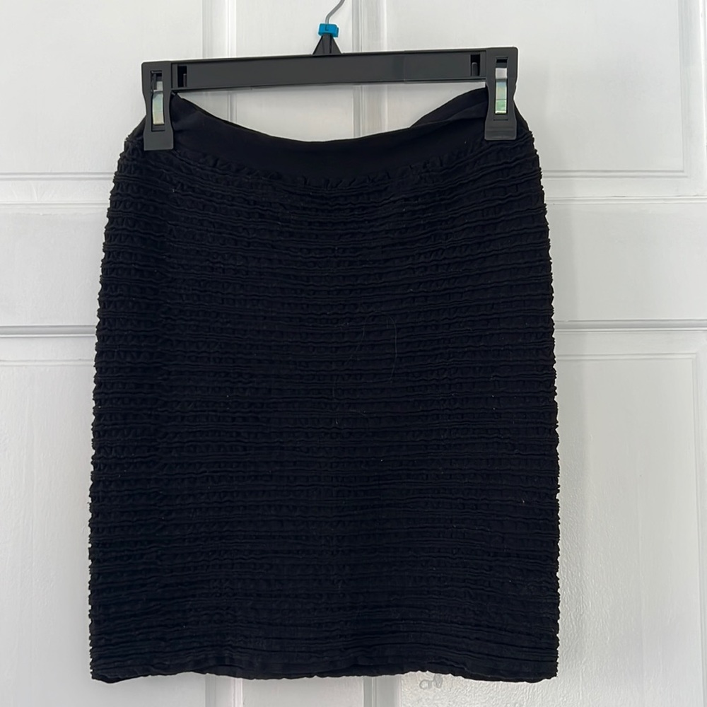 Tanco Size small stretch fit mini skirt